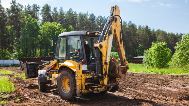 Clearing and leveling a private land plot.